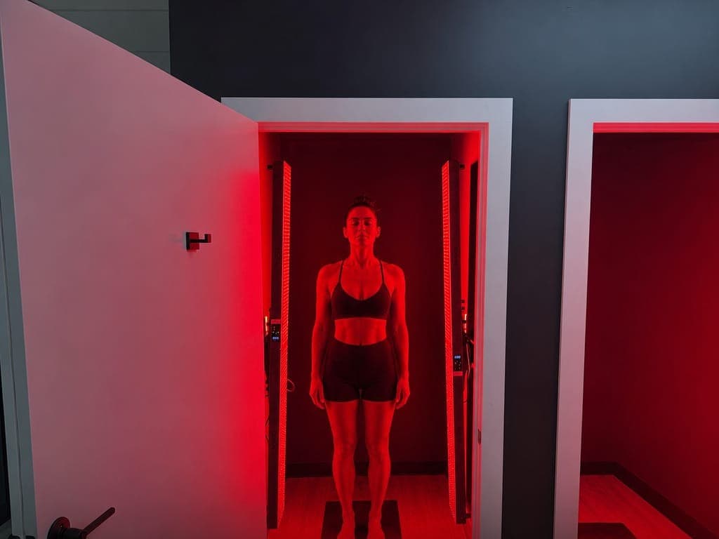 Open red light therapy room at Debrief Recovery